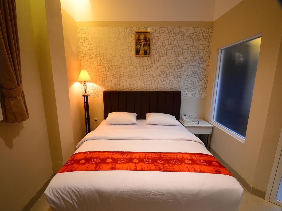 Queen City Hotel Banjarmasin Banjarmasin  Buitenkant foto